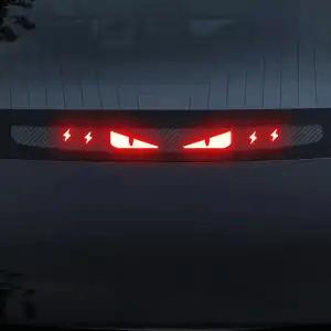 Tesla brake light projection sticker with eye pattern illuminated
