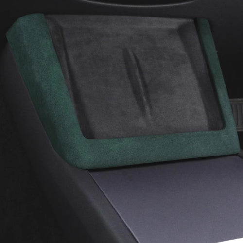 Green Alcantara wireless charging cover trim installed in Tesla center console