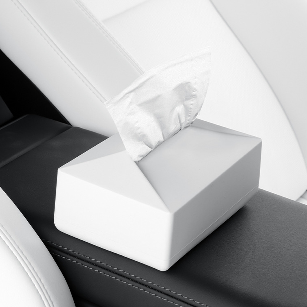 Multi-function tissue box holder inside Tesla interior