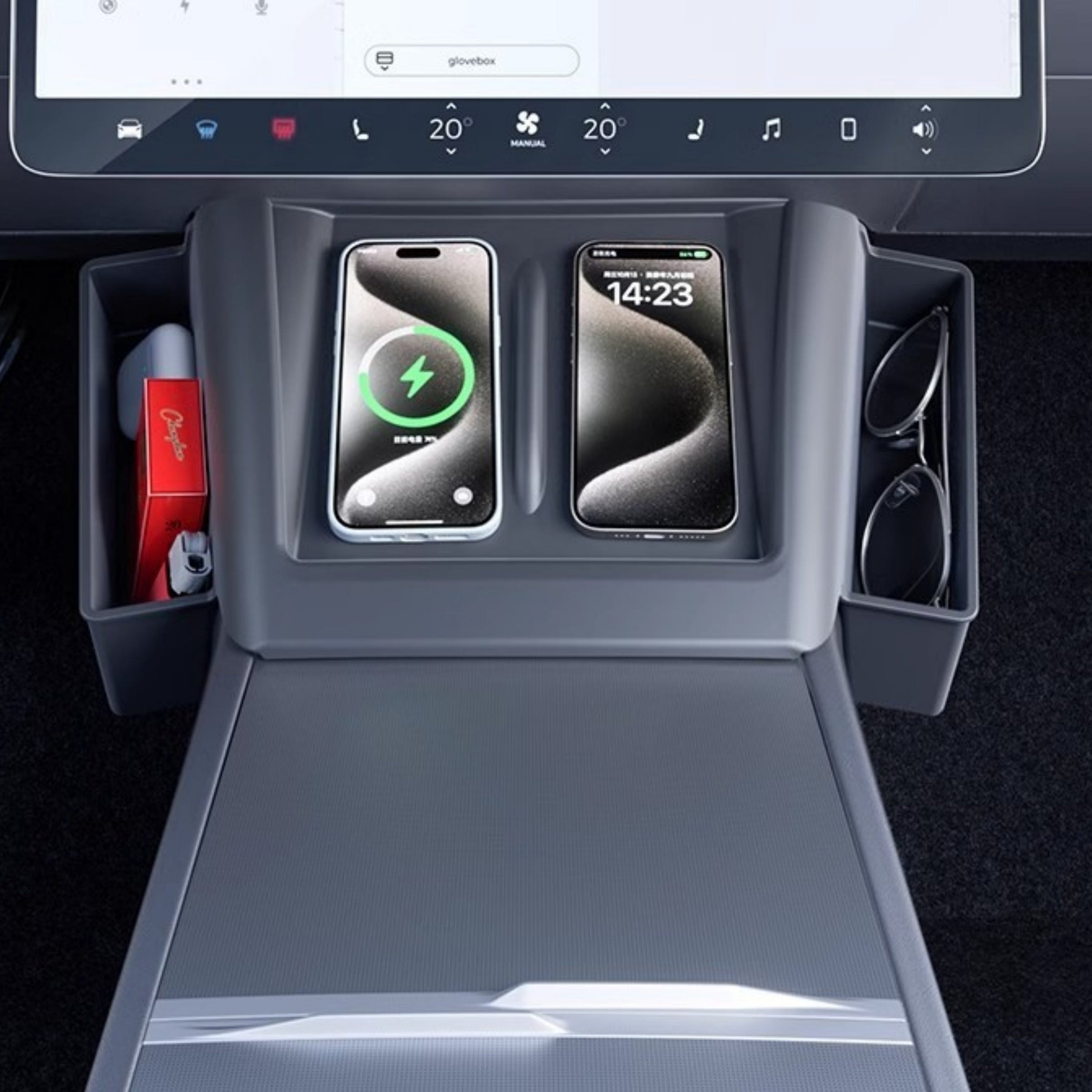 Hands placing items into Tesla center console side organizer