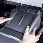 Empty Tesla Model Y Juniper / Model 3 Highland center console side organizer showing layout