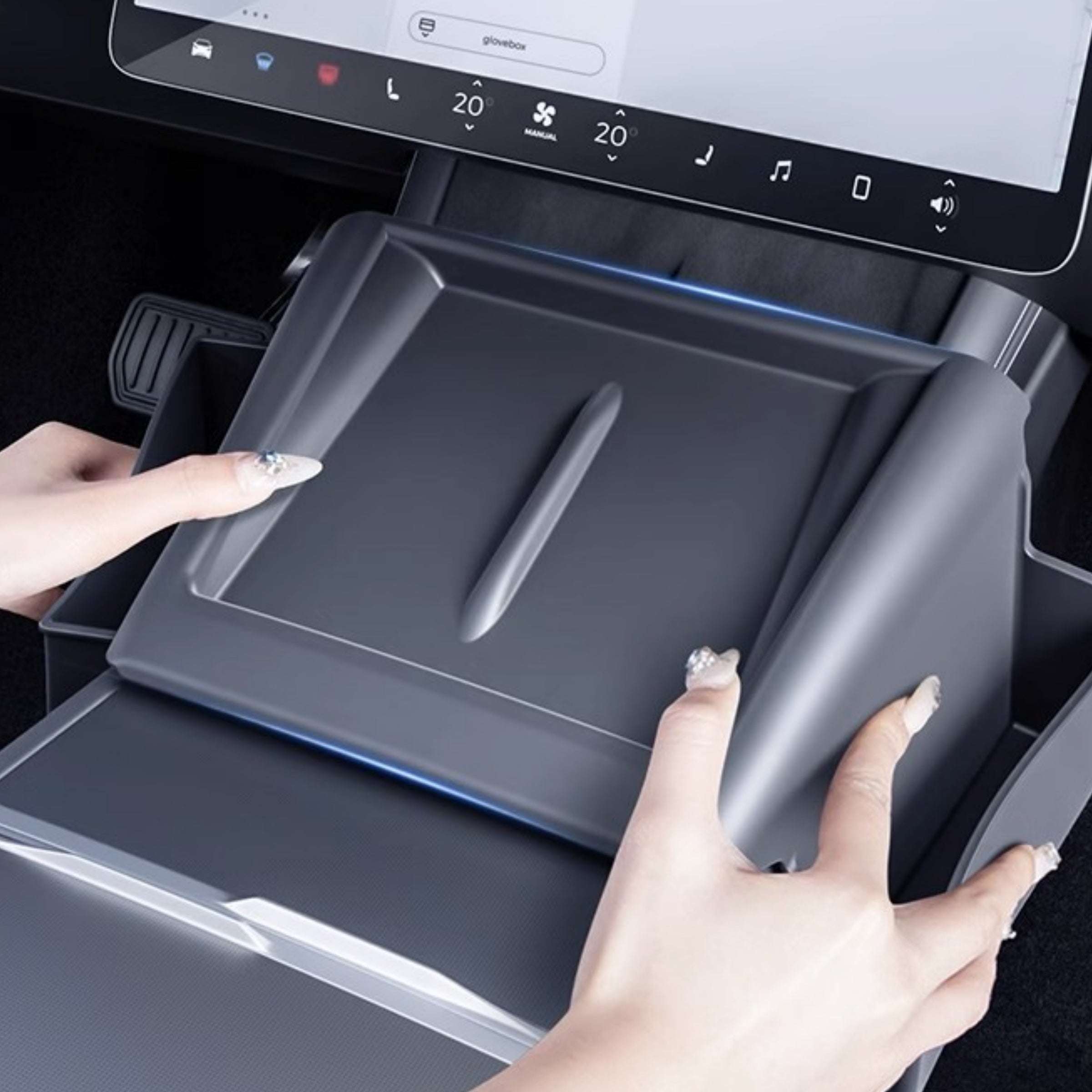 Empty Tesla Model Y Juniper / Model 3 Highland center console side organizer showing layout