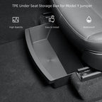 Detail view of Model Y Juniper under seat storage box