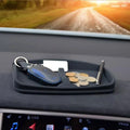 Tesla anti-skid pad holding keys coins and small items