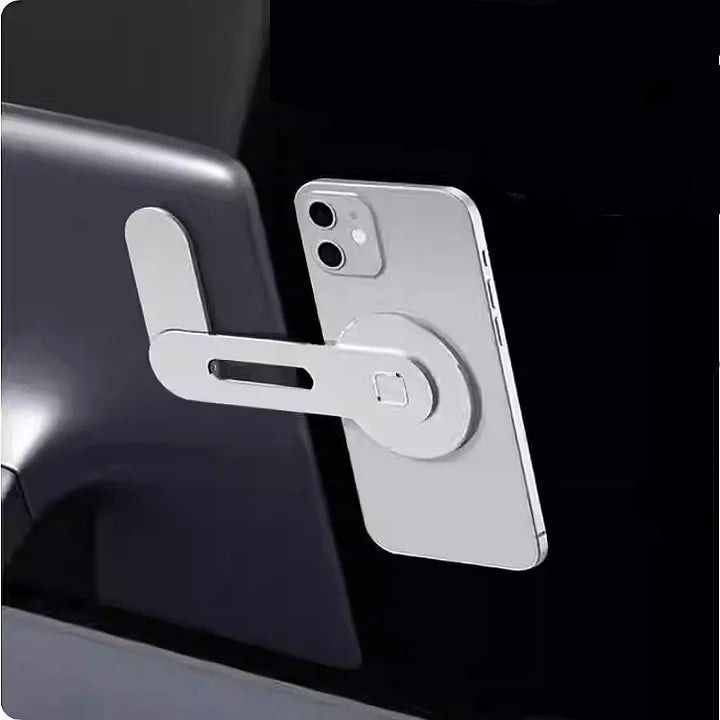 Magnetic phone attachment on Tesla wireless charging mount