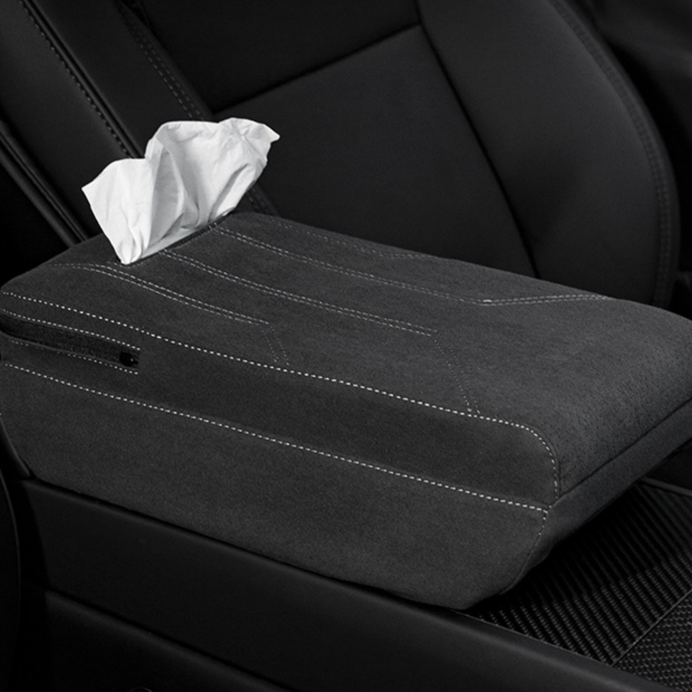 Suede armrest booster showing built-in tissue box in Tesla Model 3 / Y