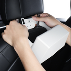 Multi-function tissue box holder inside Tesla interior