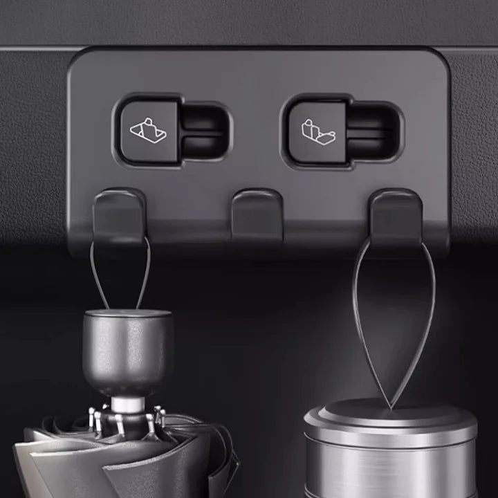 Tesla trunk hook holding umbrella and water cup
