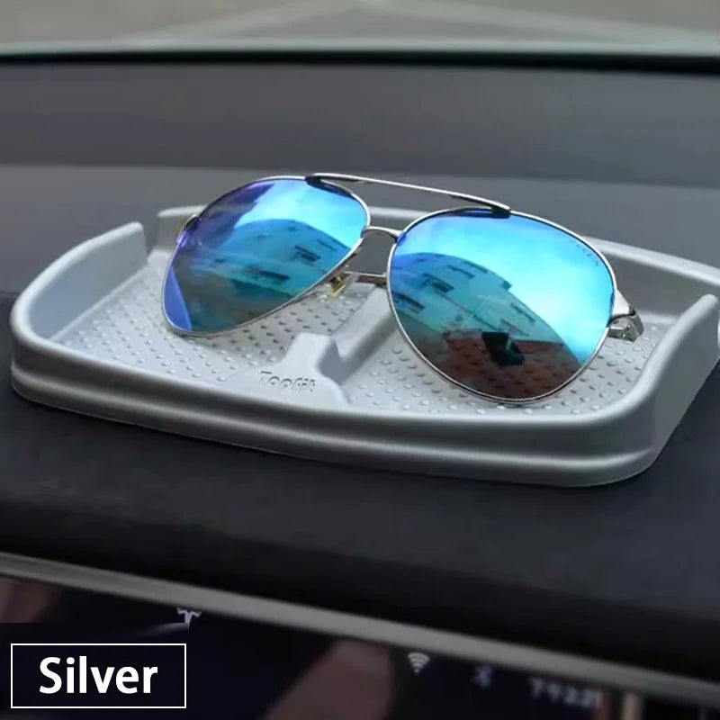 Tesla anti-skid pad holding sunglasses